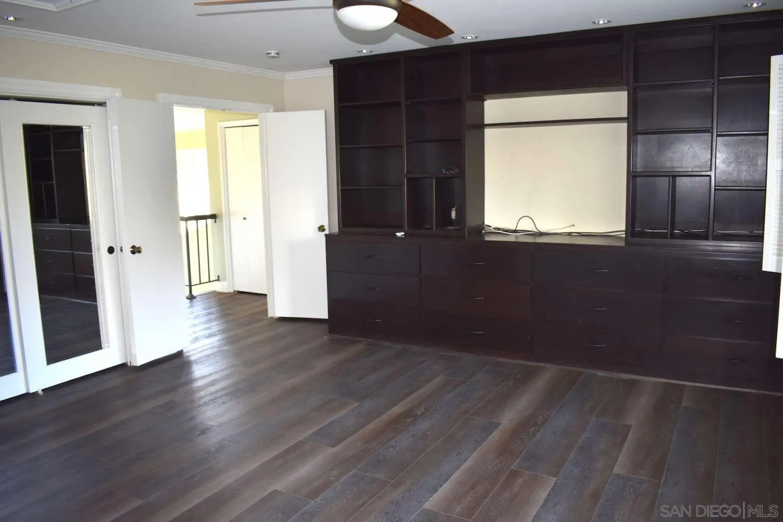 26658 Honey Creek Road Rancho Palos Verdes, CA 90275 - Photo 22 of 38 a view of an empty room with wooden floor and a window