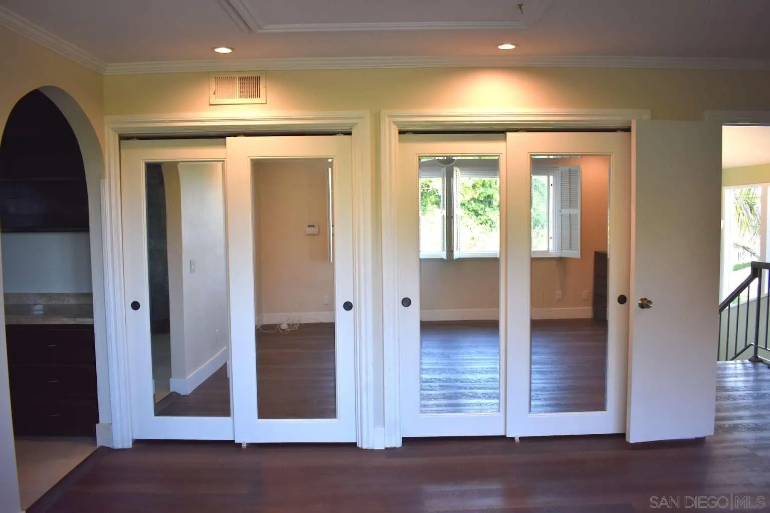 26658 Honey Creek Road Rancho Palos Verdes, CA 90275 - Photo 23 of 38 an empty room with wooden floor and windows