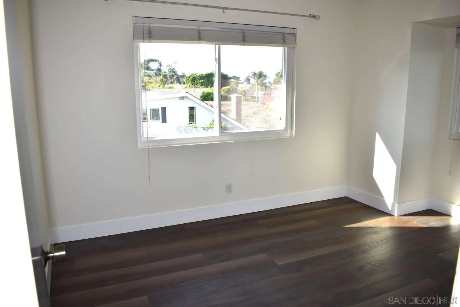 26658 Honey Creek Road Rancho Palos Verdes, CA 90275 - Photo 34 of 38 an empty room with wooden floor and windows