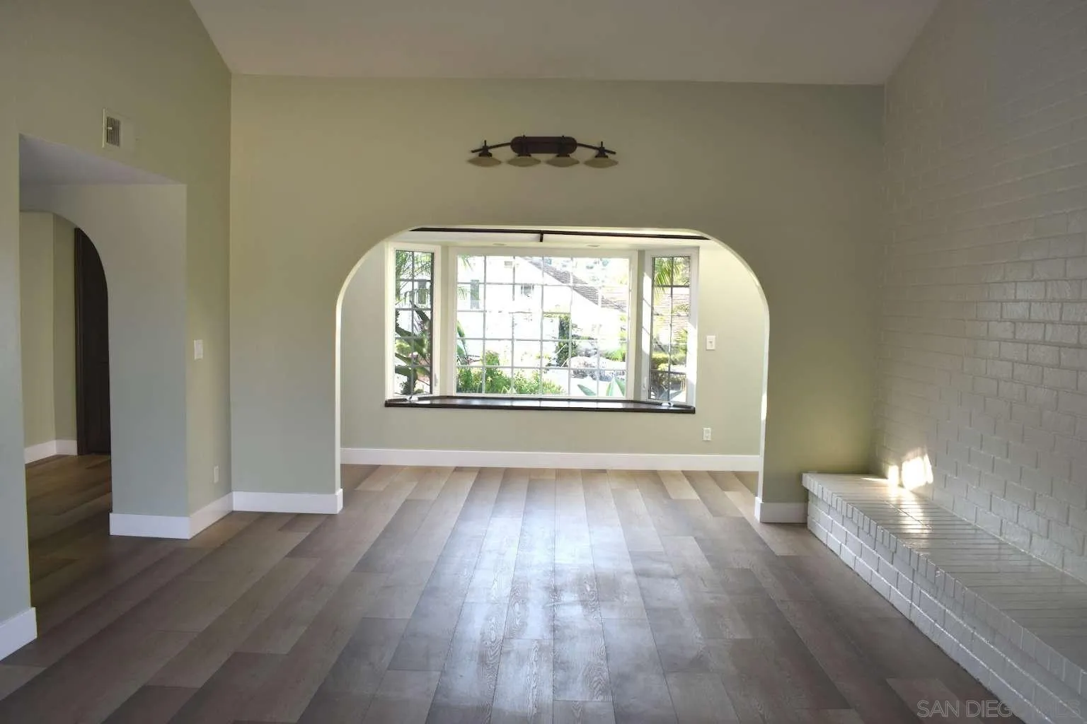 26658 Honey Creek Road Rancho Palos Verdes, CA 90275 - Photo 7 of 38 wooden floor in an empty room with a window