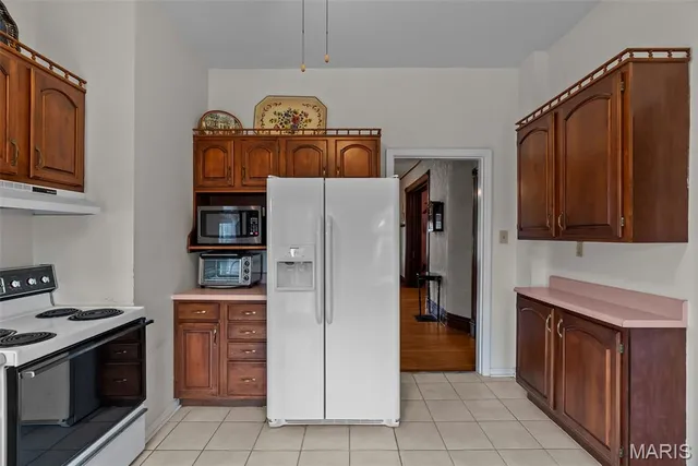 $411,000 | 7038 Pernod Avenue, St. Louis, MO 63139