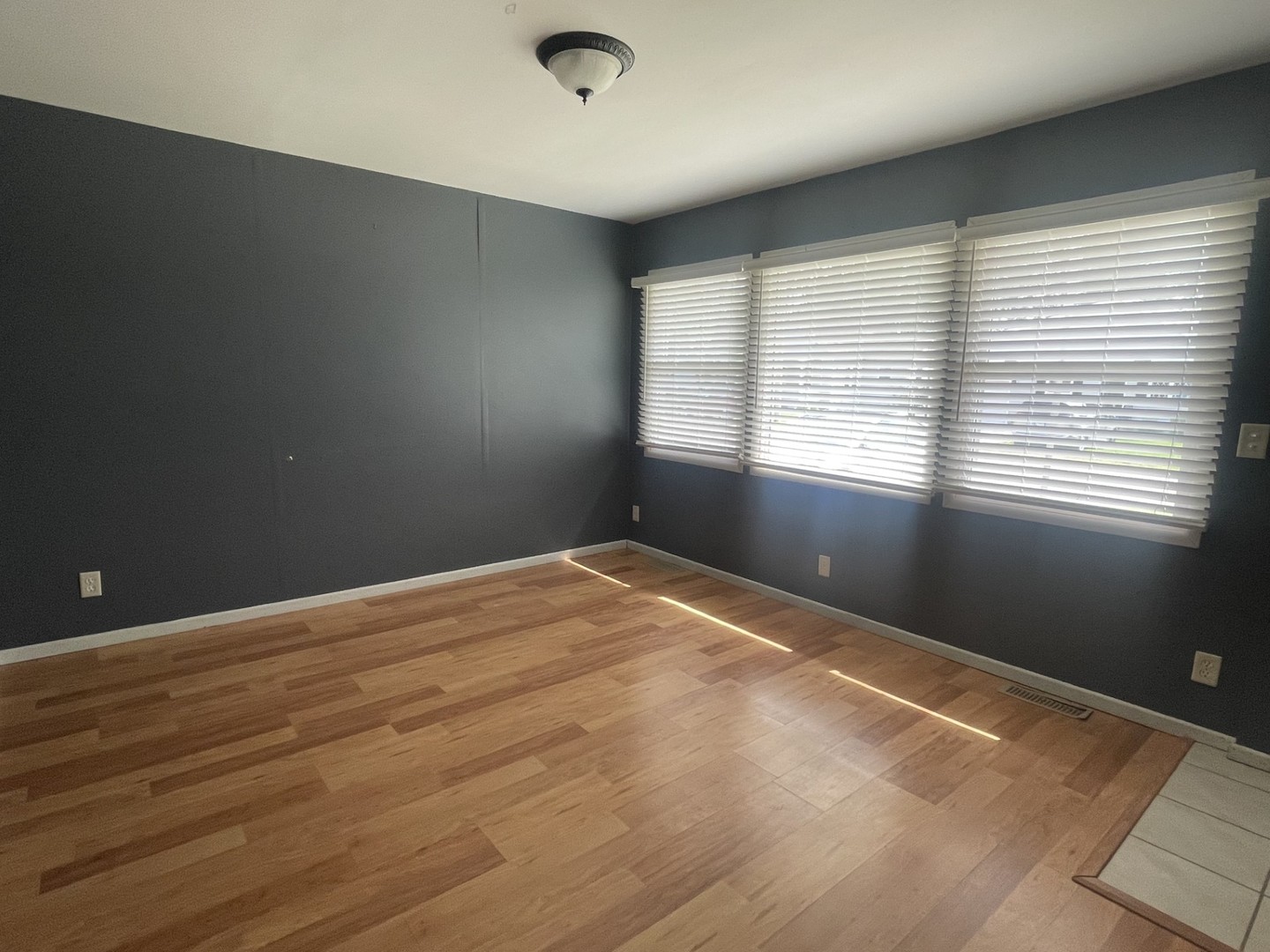 409 Elm Street Cedar Point, IL 61316 - Photo 5 of 15 an empty room with a window