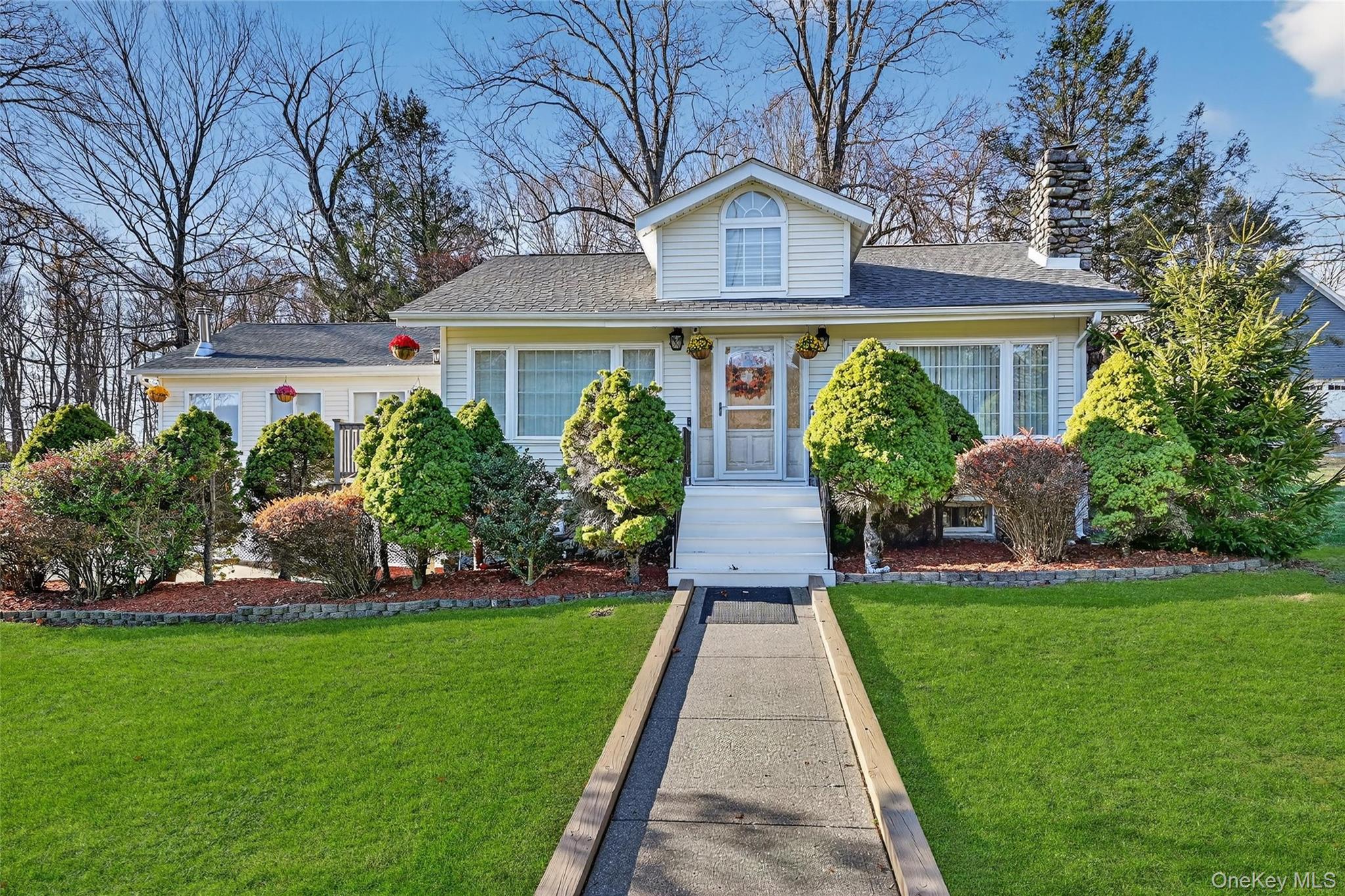 17 Pine Hill Road Highland Mills, NY 10930 - Photo 24 of 43 a front view of a house with a yard