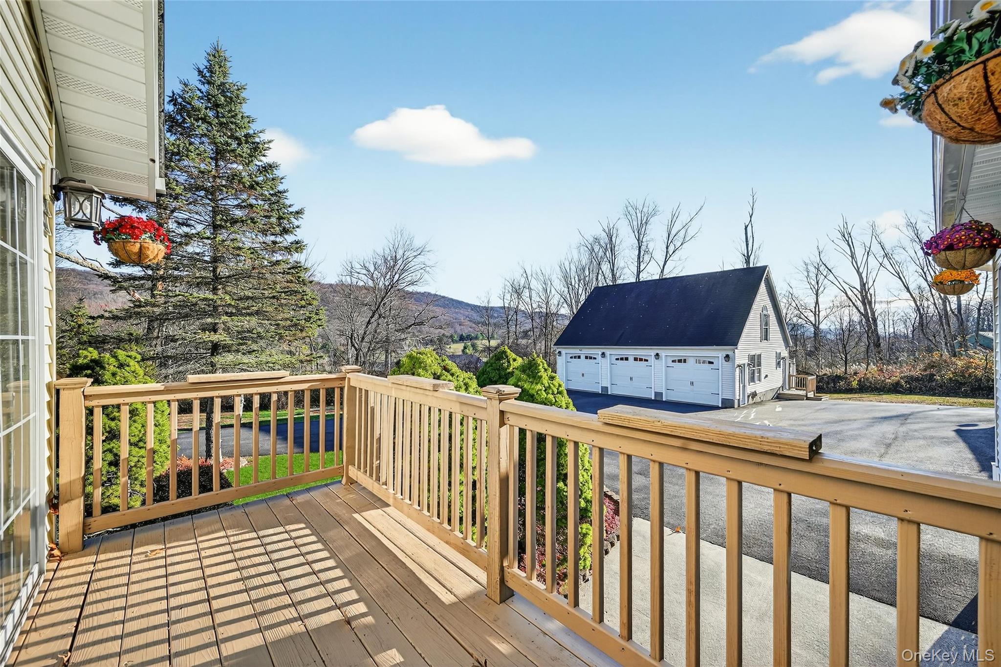17 Pine Hill Road Highland Mills, NY 10930 - Photo 30 of 43 a view of a two chairs and table in the balcony