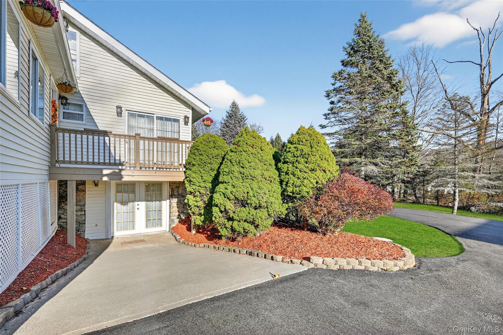 17 Pine Hill Road Highland Mills, NY 10930 - Photo 33 of 43 a view of a house with a yard and a garden