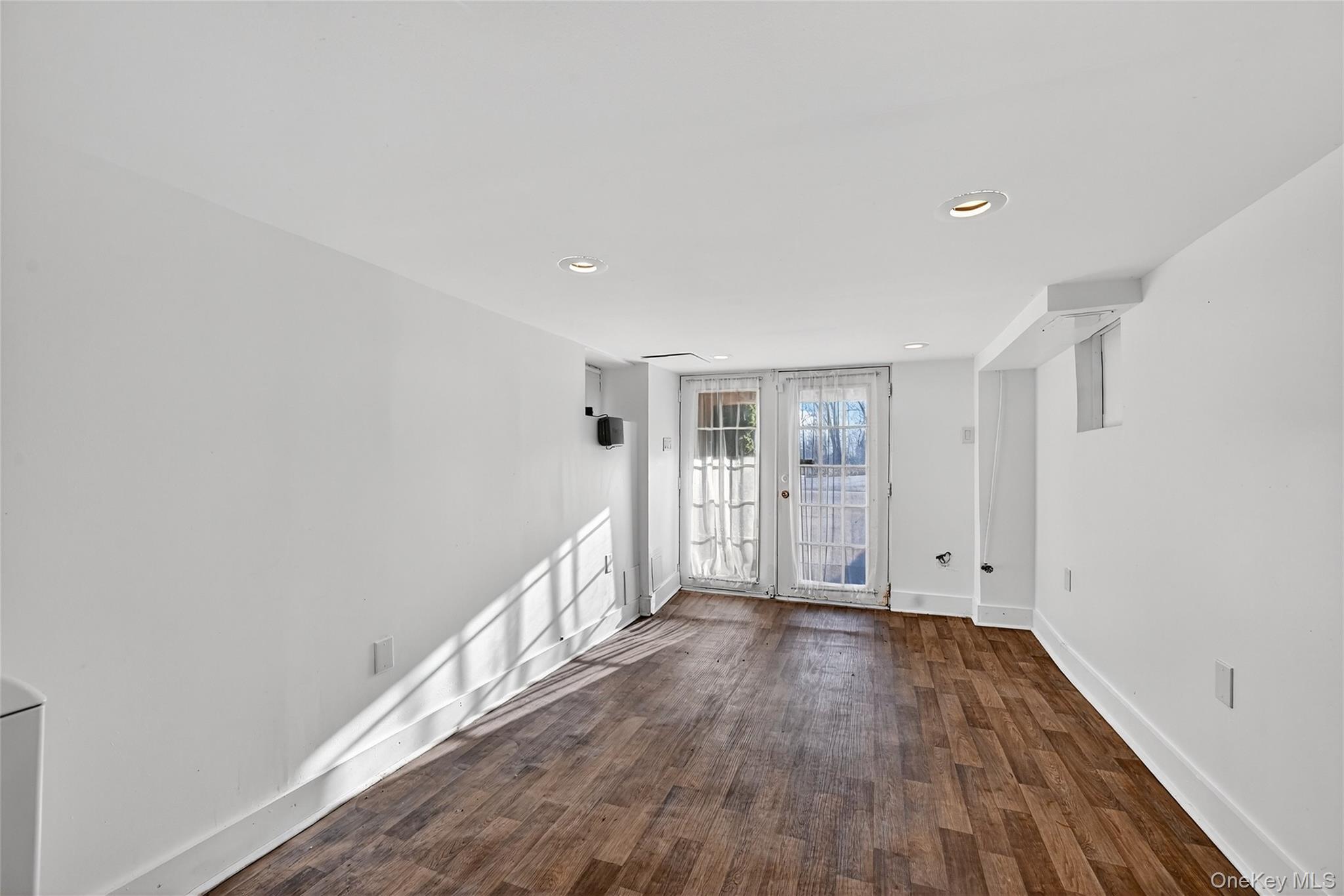 17 Pine Hill Road Highland Mills, NY 10930 - Photo 35 of 43 wooden floor in an empty room with a window