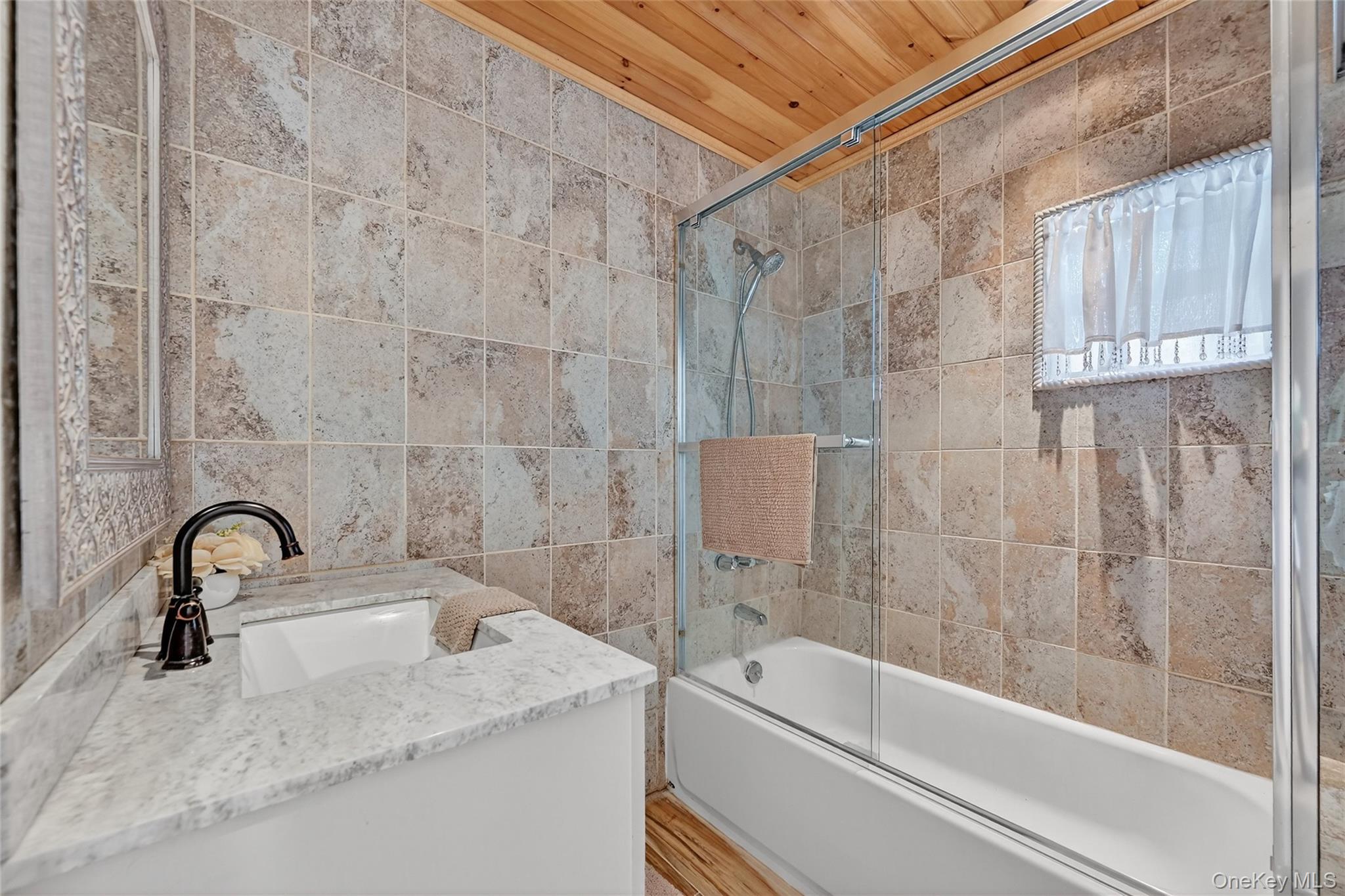 17 Pine Hill Road Highland Mills, NY 10930 - Photo 10 of 43 a bathroom with a sink and a bathtub
