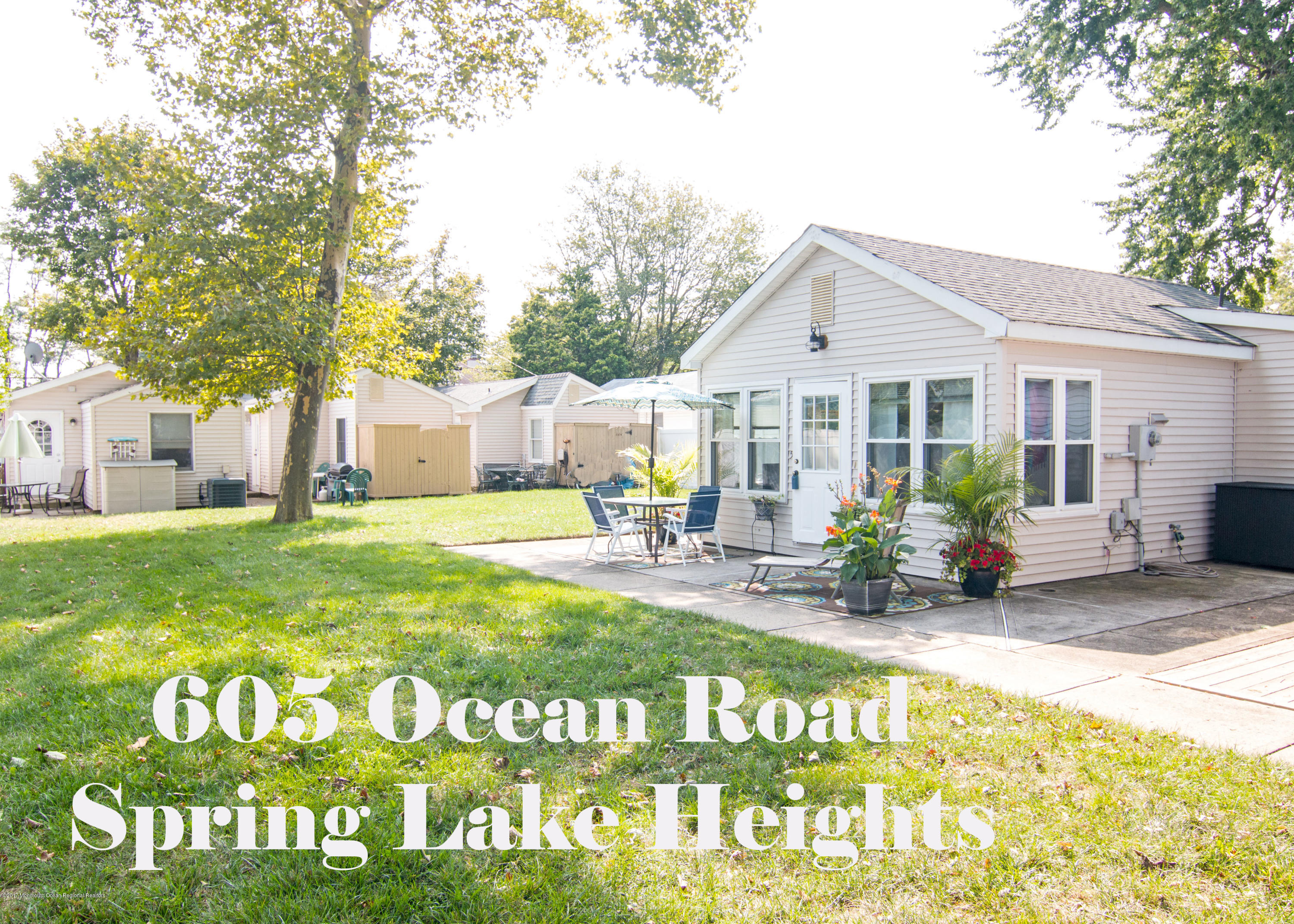 605 Ocean Road, Unit A Spring Lake Heights, NJ 07762 - Photo 18 of 18 a front view of a house with garden
