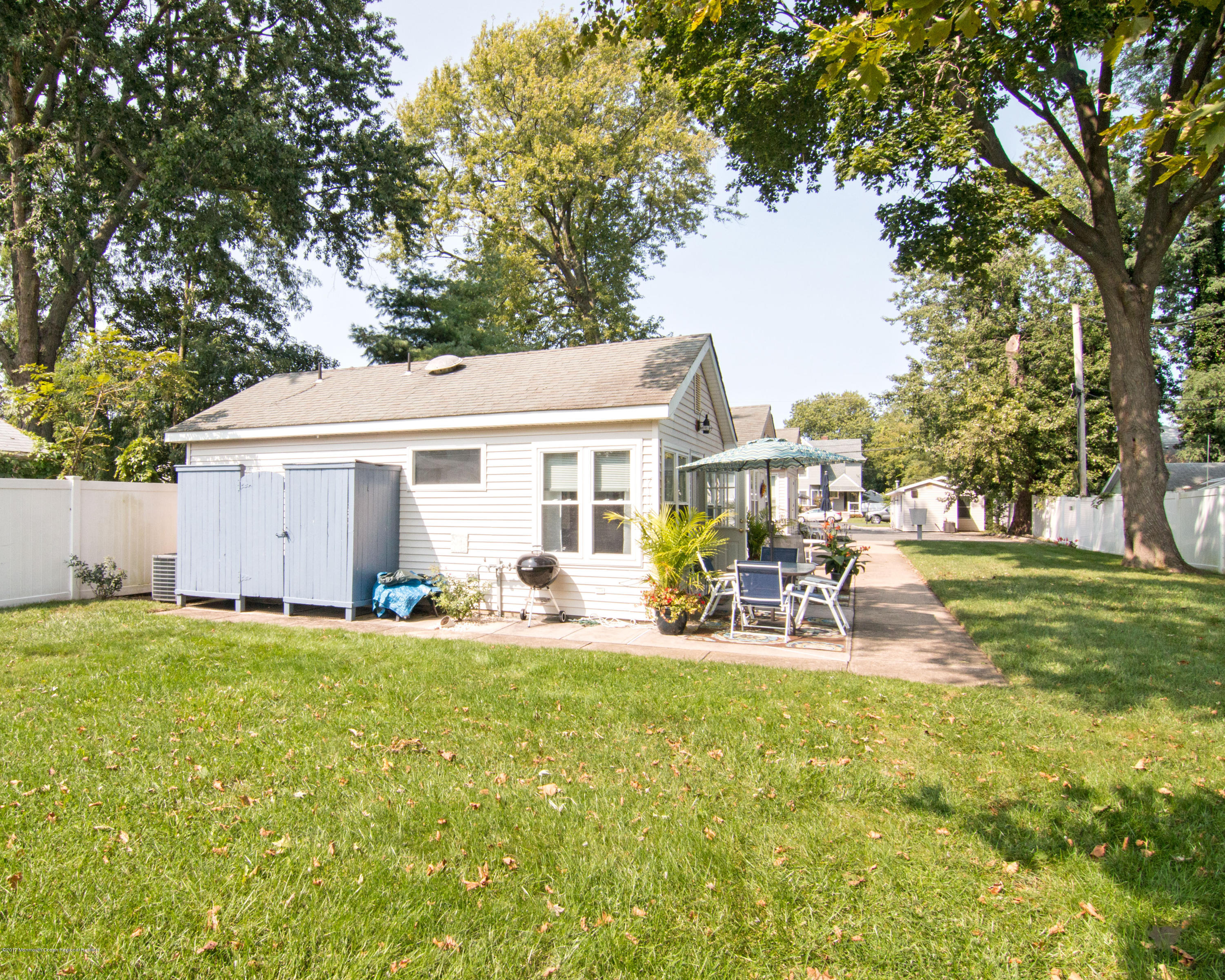 605 Ocean Road, Unit A Spring Lake Heights, NJ 07762 - Photo 3 of 18 a view of a house with backyard and sitting area