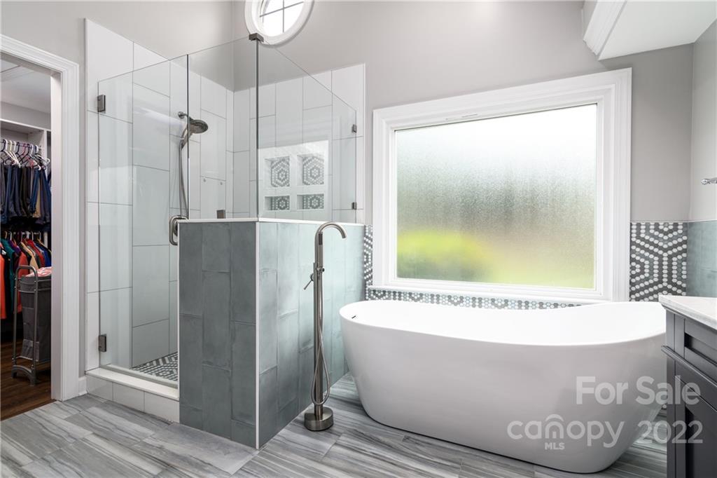 3364 Blue Jay Pass Fort Mill, SC 29708 - Photo 11 of 30 a view of a bathtub in a bathroom
