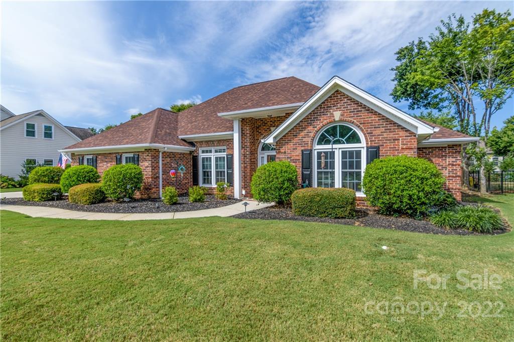 3364 Blue Jay Pass Fort Mill, SC 29708 - Photo 27 of 30 a front view of a house with a yard and porch