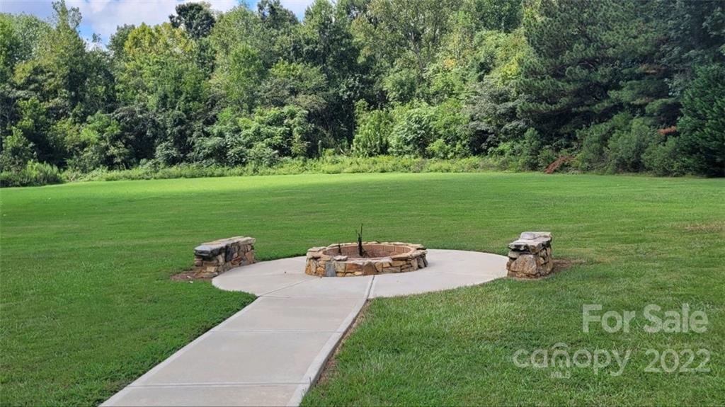 3364 Blue Jay Pass Fort Mill, SC 29708 - Photo 30 of 30 a garden view with a sitting space and garden
