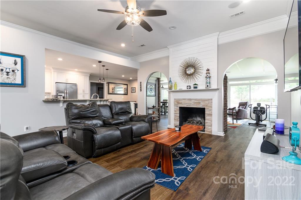3364 Blue Jay Pass Fort Mill, SC 29708 - Photo 5 of 30 a living room with furniture and a fireplace