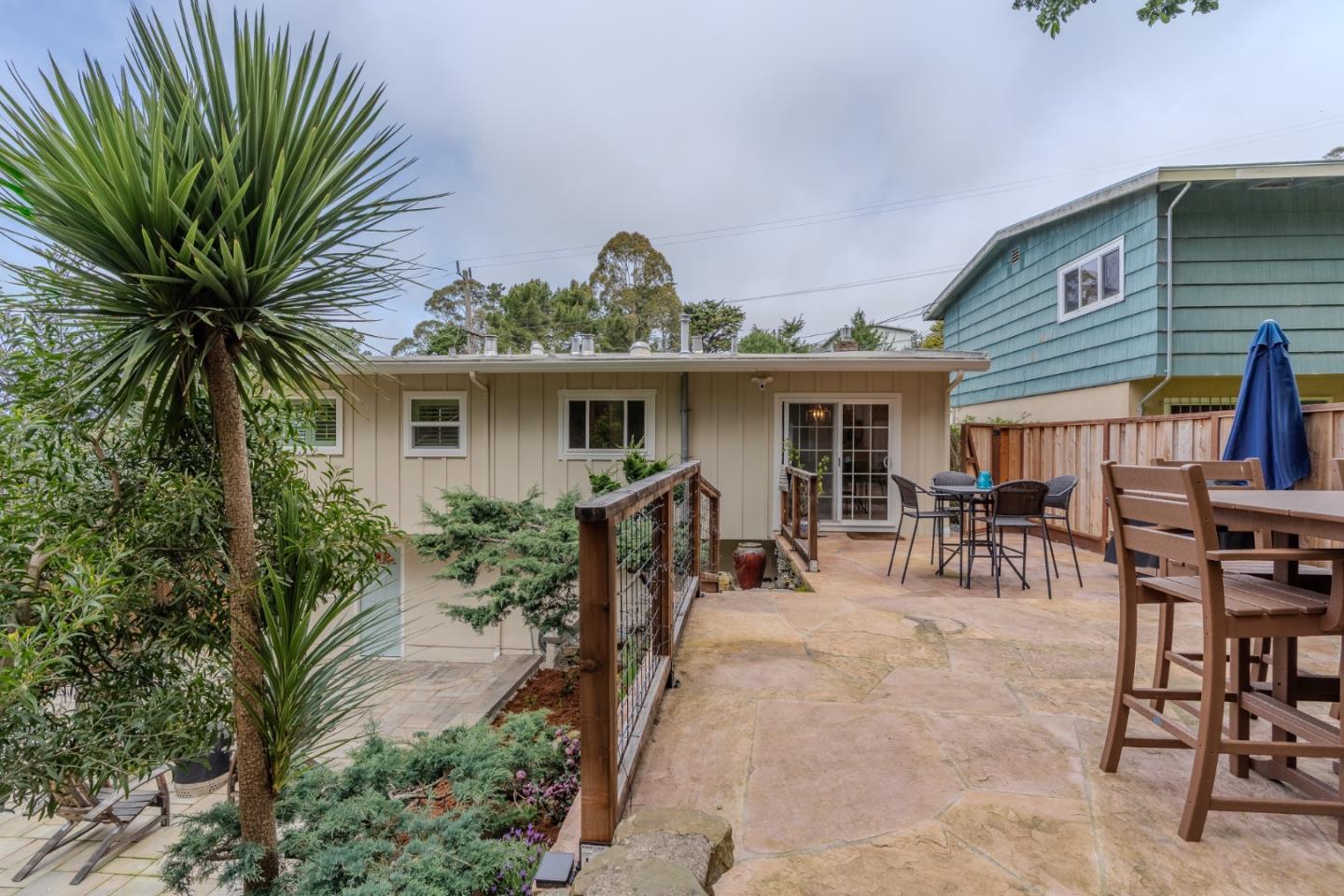 1080 Barcelona Drive Pacifica, CA 94044 - Photo 31 of 48 a view of a dinning table and chairs in patio