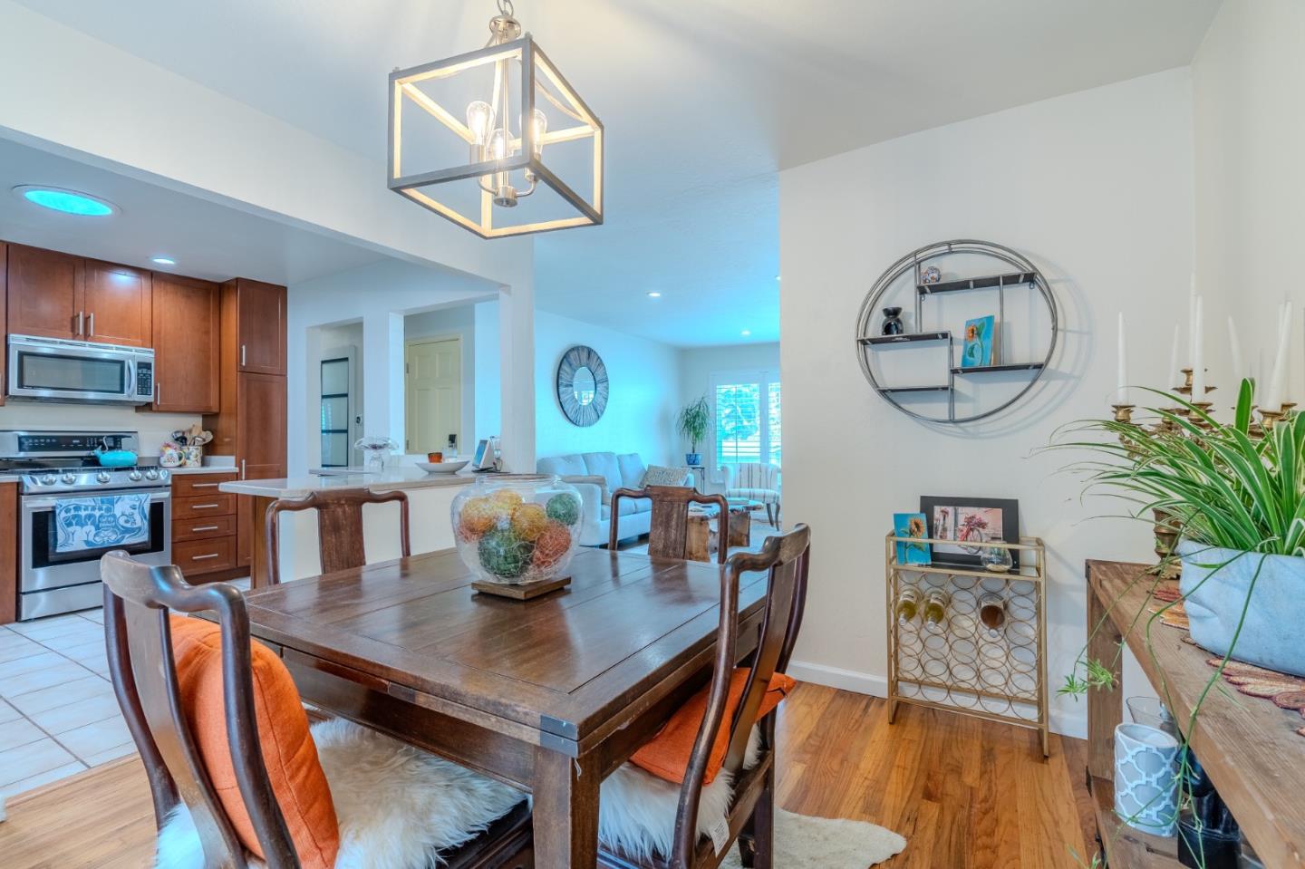 1080 Barcelona Drive Pacifica, CA 94044 - Photo 9 of 48 a view of a dining room with furniture and wooden floor