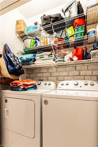 a utility room with washer and dryer