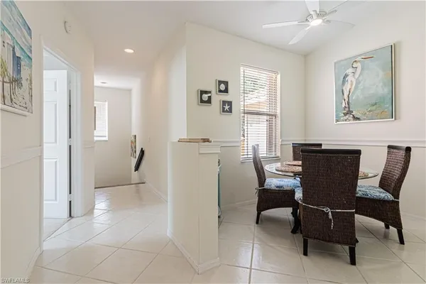 a view of a dining room with furniture and a livingroom