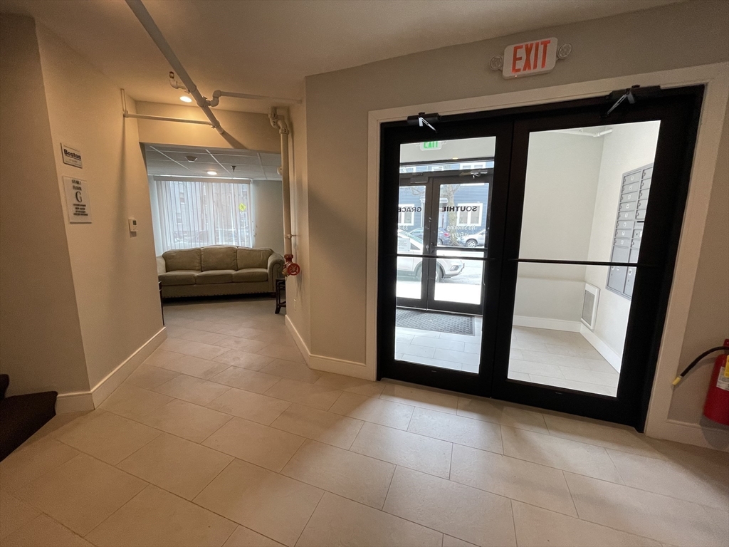 33 Ward Street, Unit 3 Boston, MA 02127 - Photo 15 of 21 a view of a livingroom with furniture and a window