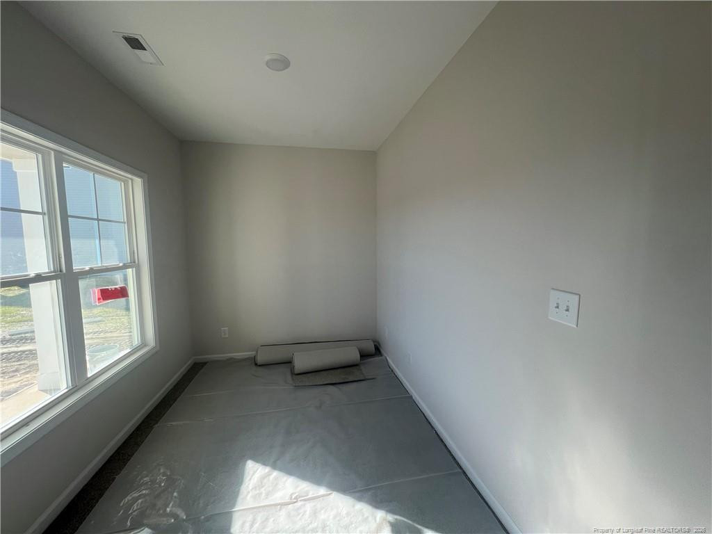4075 Blue Springs Road Red Springs, NC 28377 - Photo 2 of 28 an empty room with windows