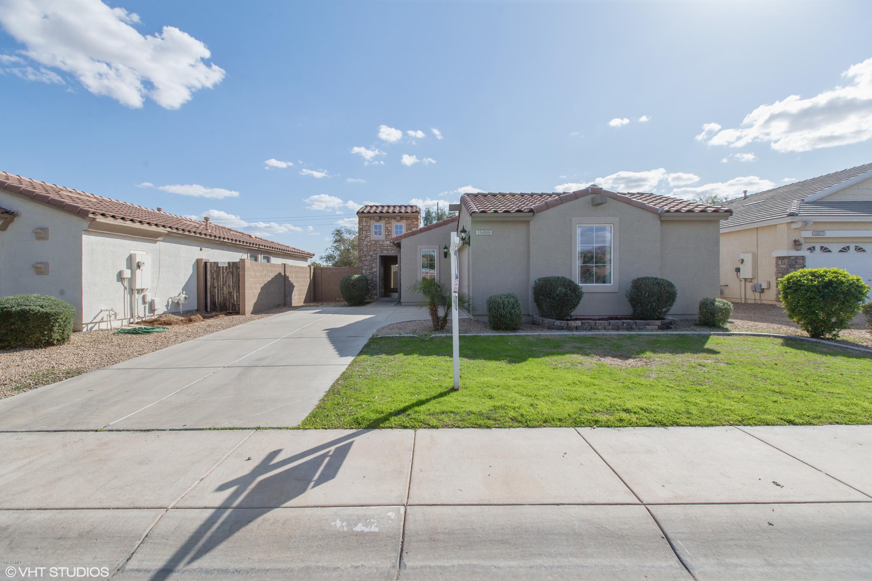 15069 West Wethersfield Road Surprise, AZ 85379 - Photo 1 of 23 01_15069WWETHERSFIELDRD_2001_HiRes