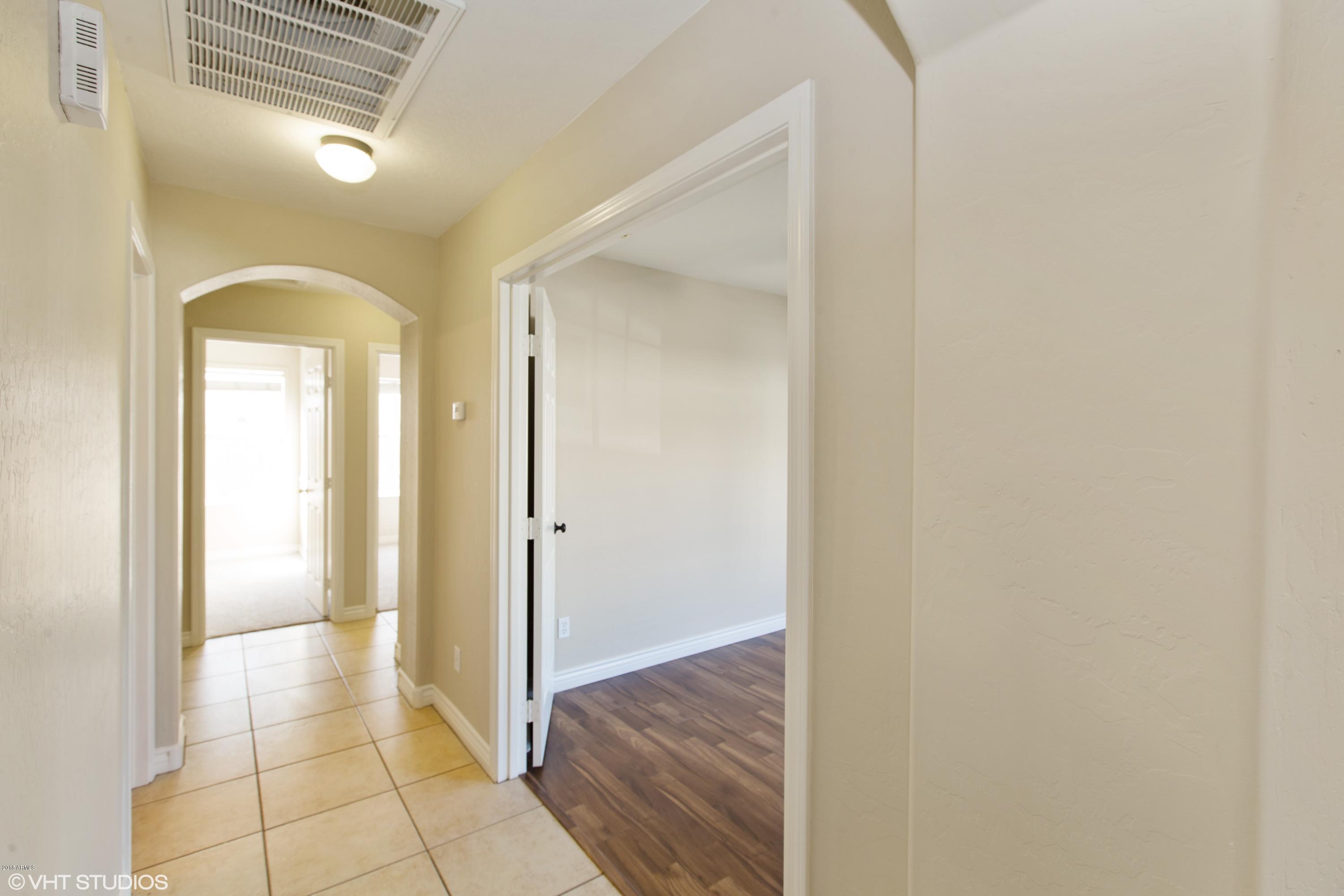 15069 West Wethersfield Road Surprise, AZ 85379 - Photo 15 of 23 15_15069WWETHERSFIELDRD_2015_HiRes
