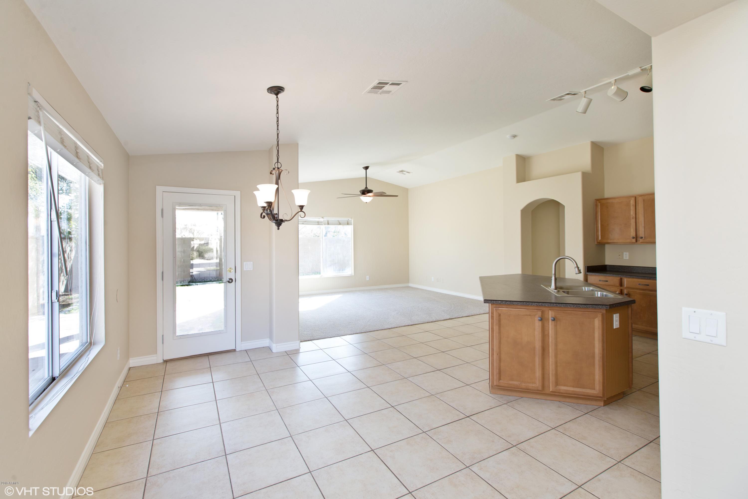 15069 West Wethersfield Road Surprise, AZ 85379 - Photo 3 of 23 03_15069WWETHERSFIELDRD_2003_HiRes