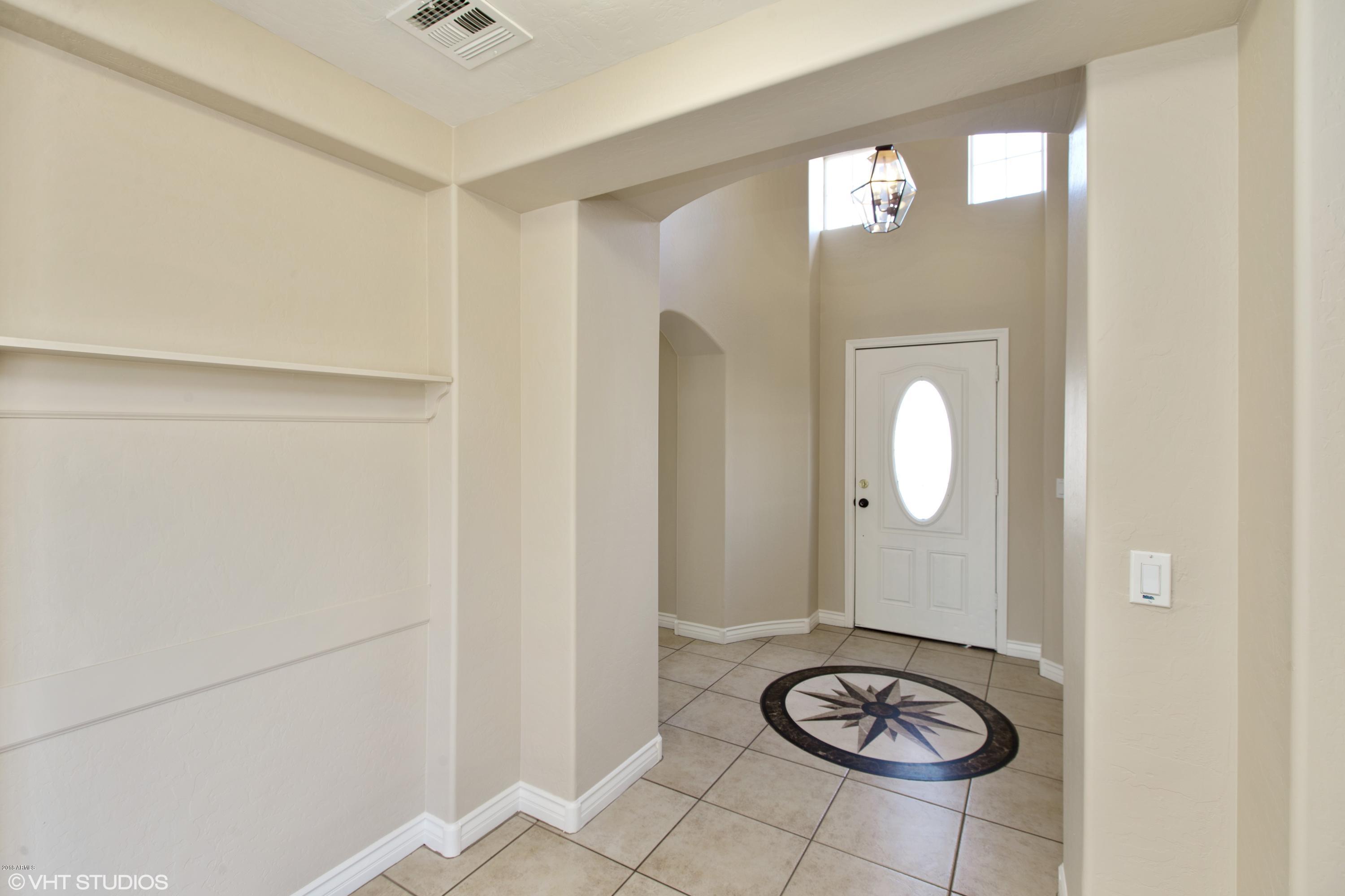 15069 West Wethersfield Road Surprise, AZ 85379 - Photo 4 of 23 04_15069WWETHERSFIELDRD_2004_HiRes