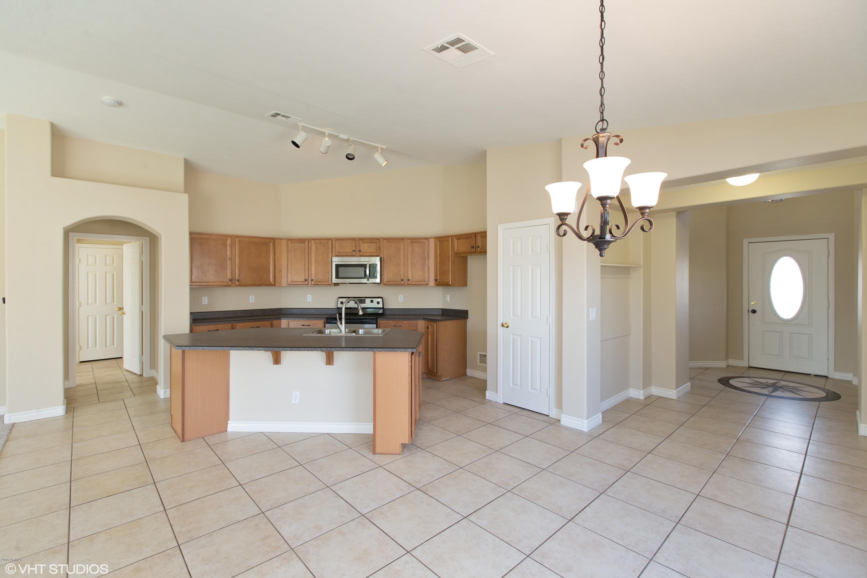 15069 West Wethersfield Road Surprise, AZ 85379 - Photo 5 of 23 05_15069WWETHERSFIELDRD_2005_HiRes