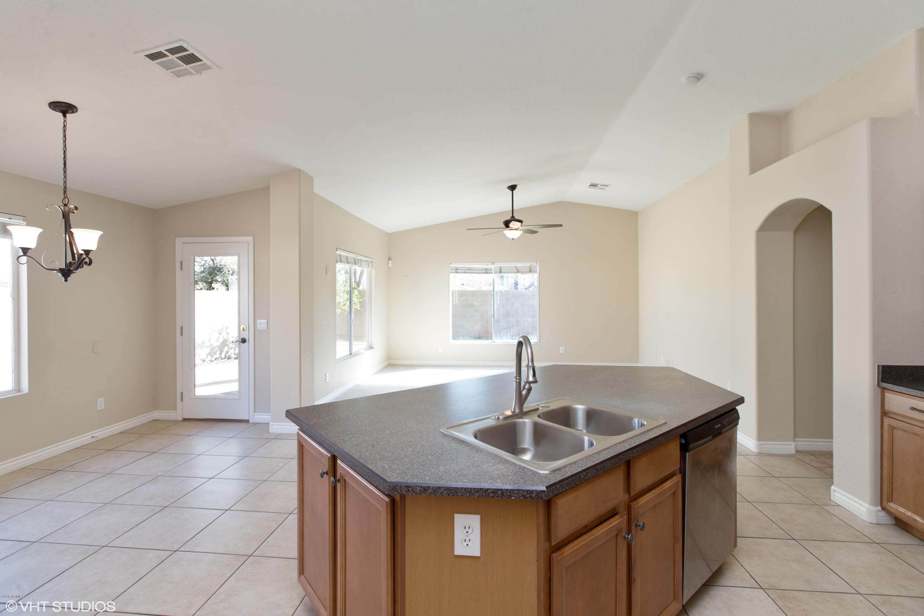 15069 West Wethersfield Road Surprise, AZ 85379 - Photo 8 of 23 08_15069WWETHERSFIELDRD_2008_HiRes