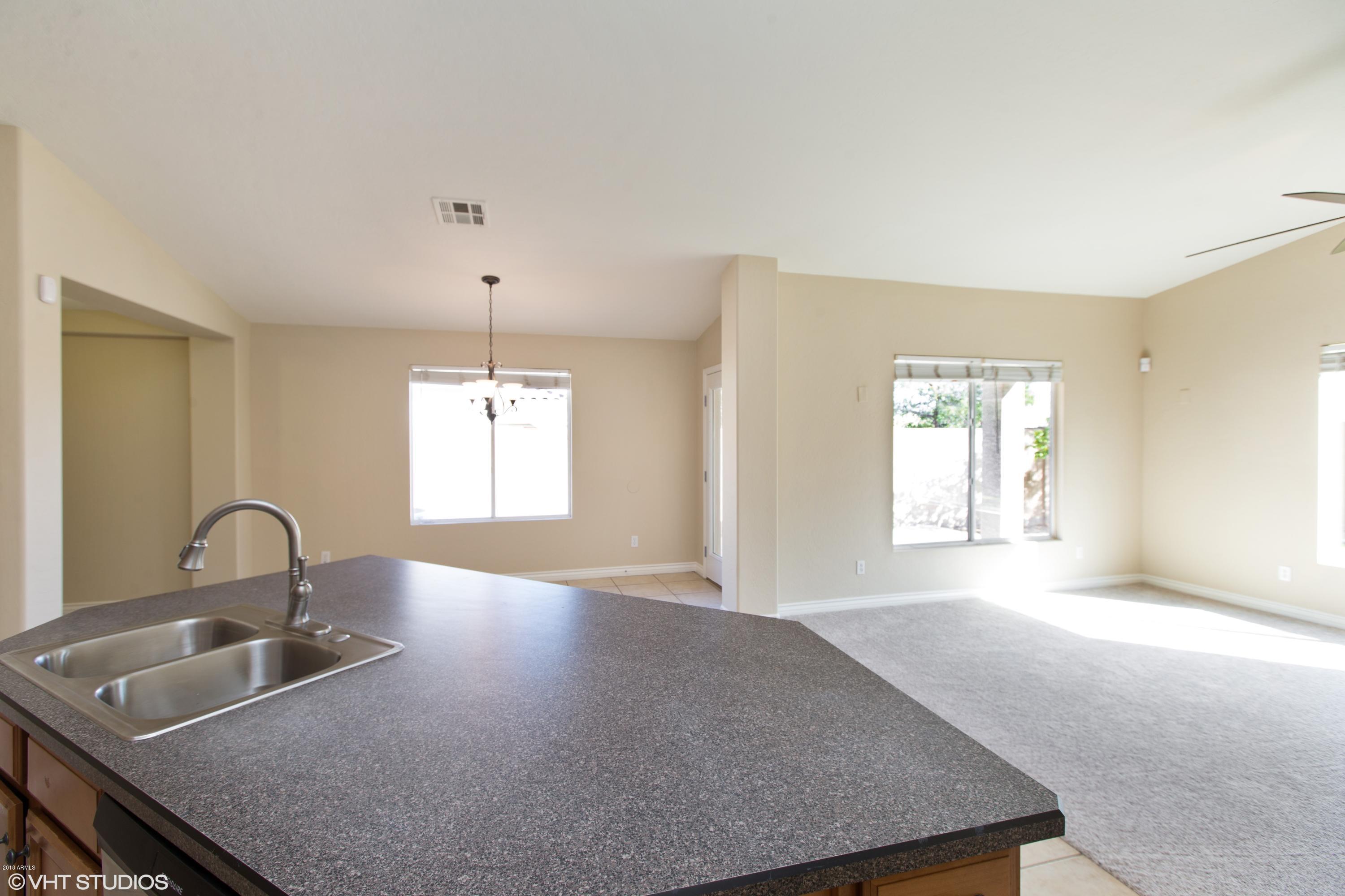 15069 West Wethersfield Road Surprise, AZ 85379 - Photo 9 of 23 09_15069WWETHERSFIELDRD_2009_HiRes