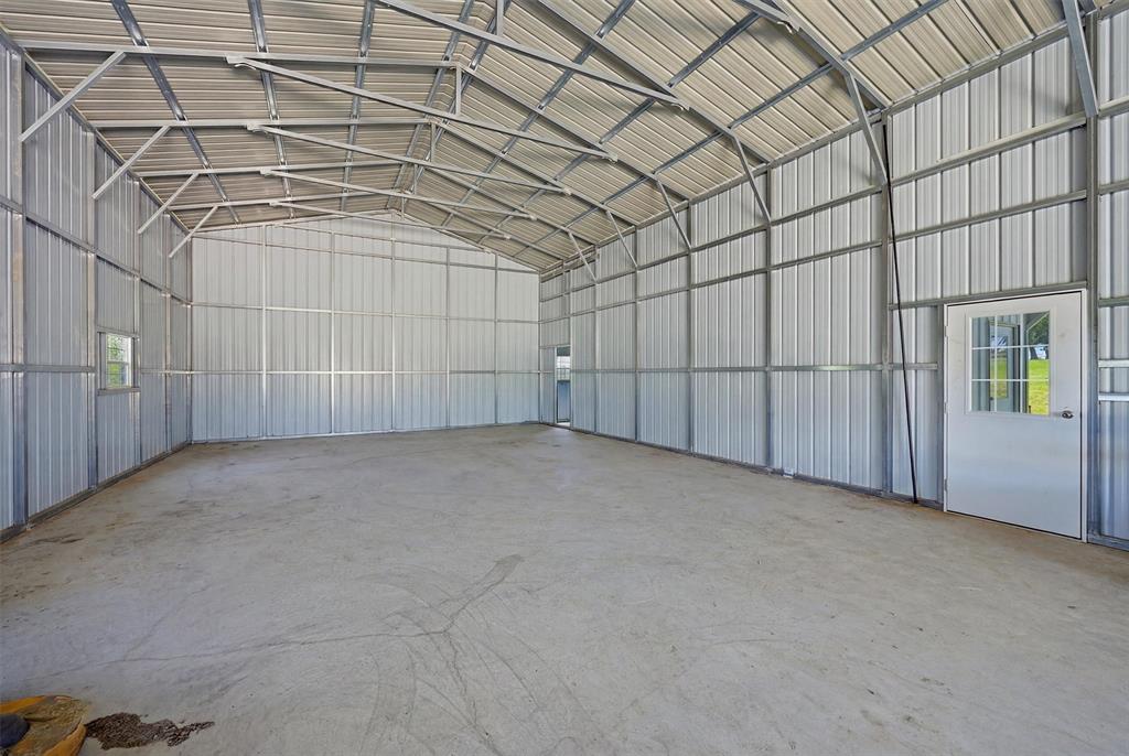 662 Preakness Place Road Van Alstyne, TX 75495 - Photo 31 of 39 a view of a garage