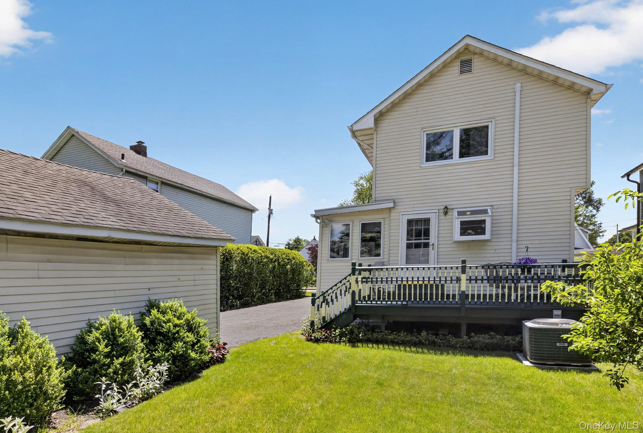 250 Rombout Avenue Beacon, NY 12508 - Photo 26 of 33 a view of a house with a small yard and plants