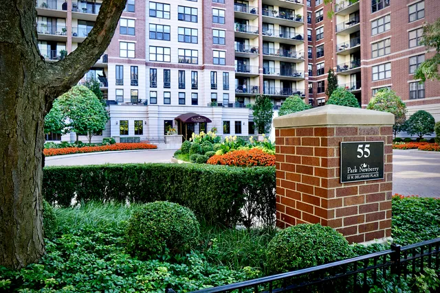 front view of an buildings with a yard