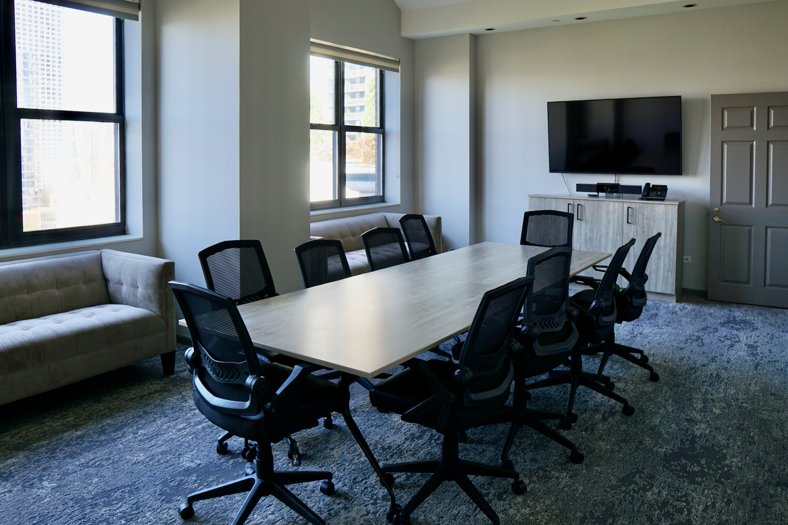 55 West Delaware Place, Unit 221 Chicago, IL 60610 - Photo 27 of 29 a view of a dining room with furniture and a flat screen tv