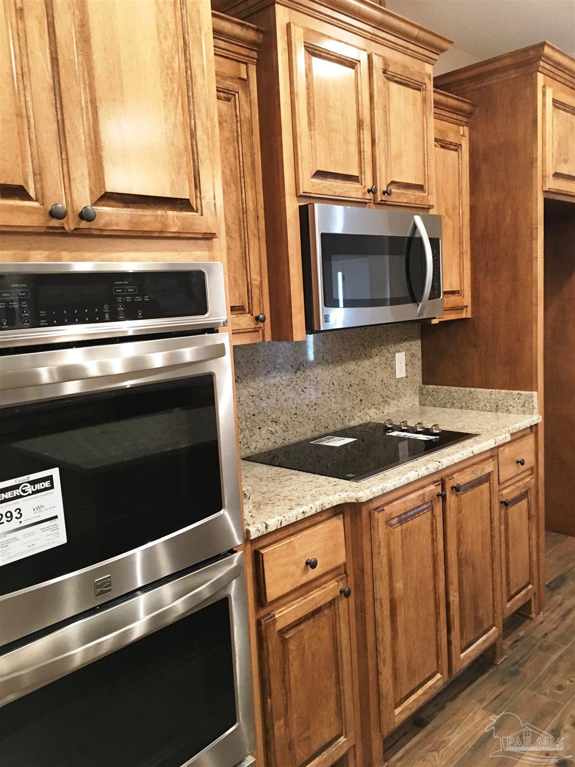 5294 South A Jones Road Milton, FL 32583 - Photo 5 of 35 Kitchen has a wall oven & separate cooktop.