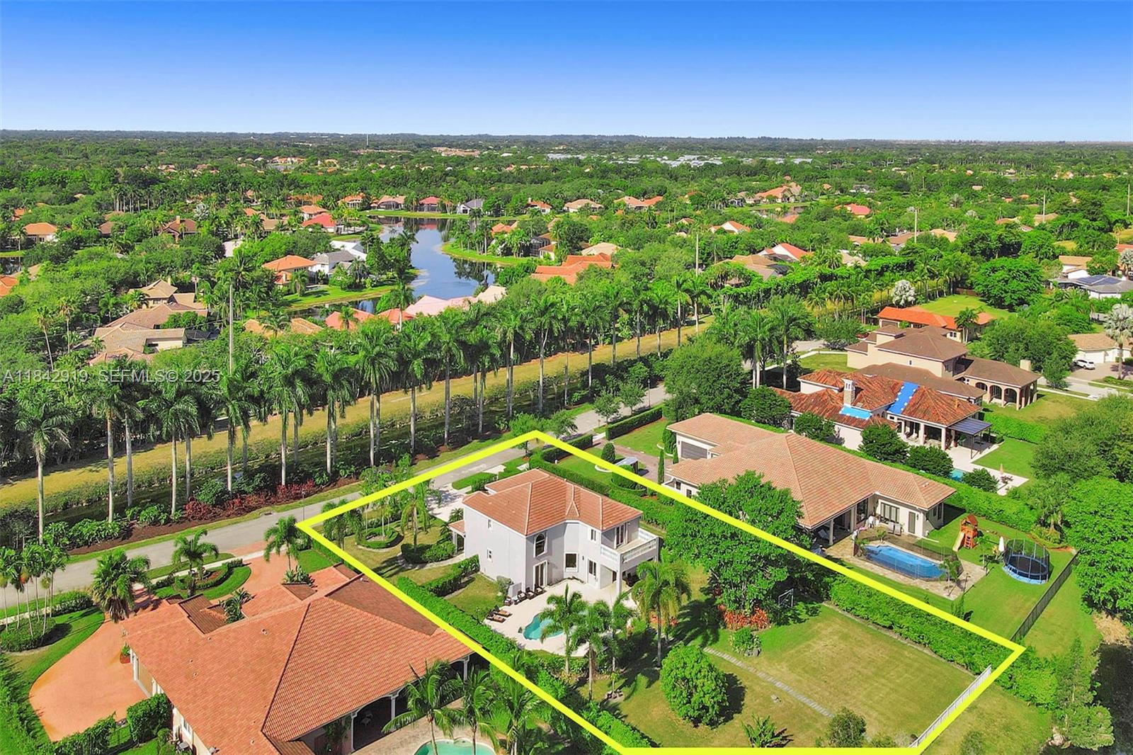 721 Ranch Road Weston, FL 33326 - Photo 6 of 38 an aerial view of residential houses with outdoor space and garden