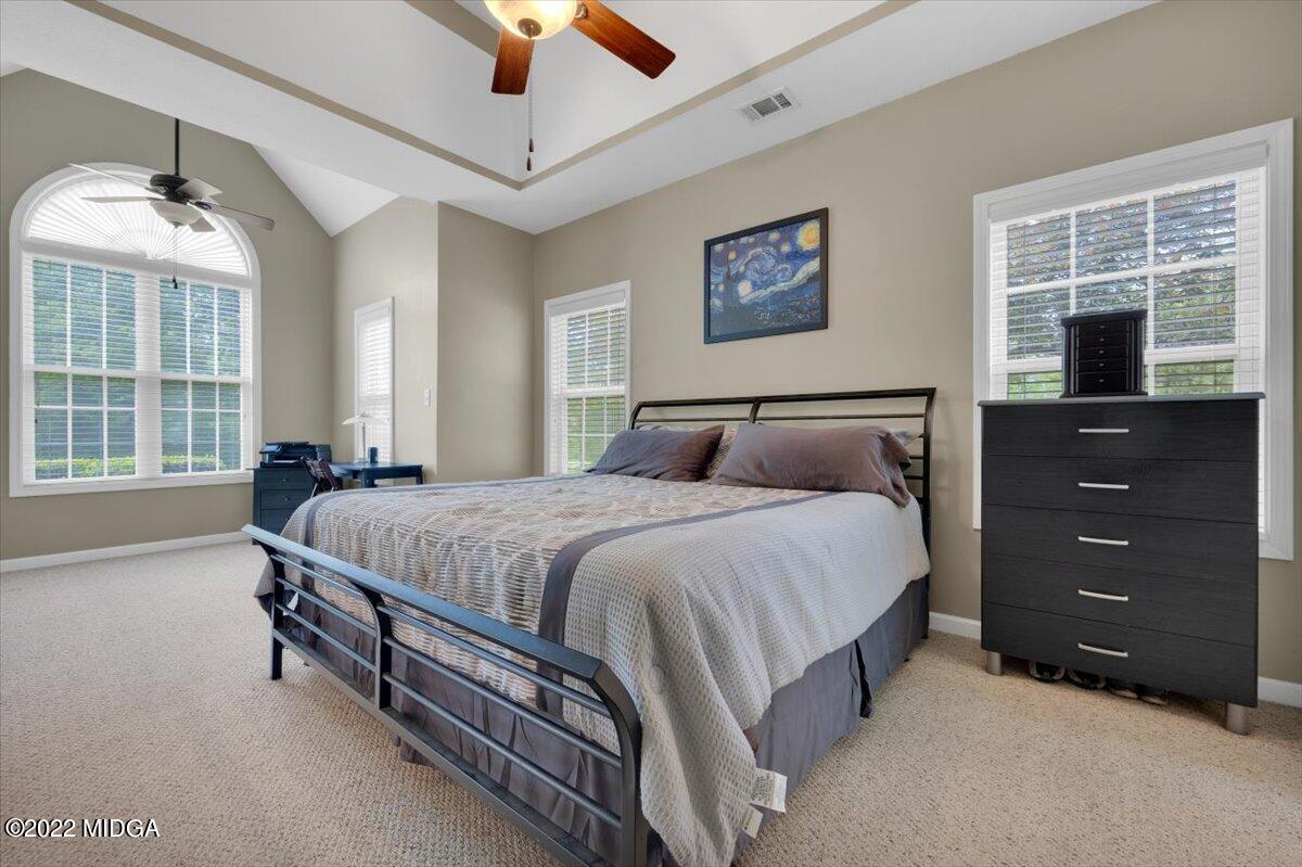 1360 Patterson Road Griffin, GA 30223 - Photo 17 of 24 a bedroom with a bed and a window
