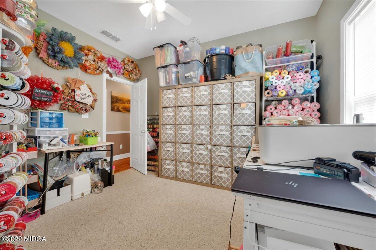 1360 Patterson Road Griffin, GA 30223 - Photo 22 of 24 a room with storage and utility