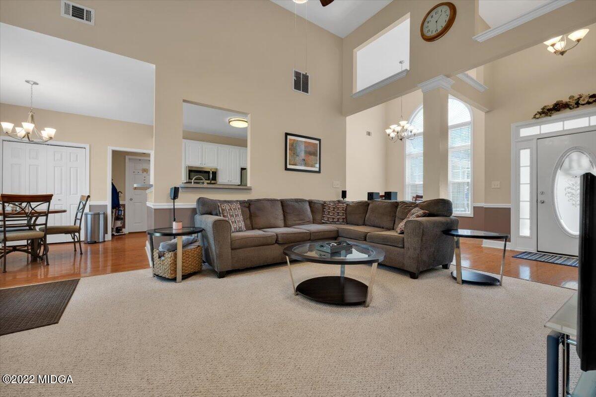 1360 Patterson Road Griffin, GA 30223 - Photo 7 of 24 a living room with furniture and a large window
