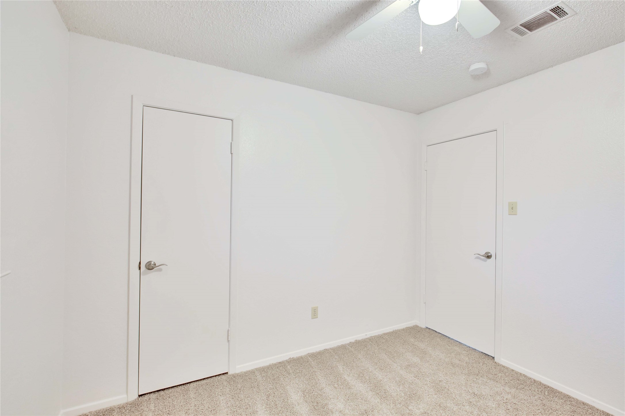 2807 Firecrest Drive Austin, TX 78748 - Photo 10 of 30 an empty room with a chandelier fan