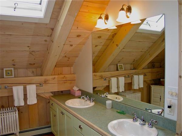 6 Holly Briar Road Aquinnah, MA 02535 - Photo 11 of 15 a bathroom with a double vanity sink and a mirror