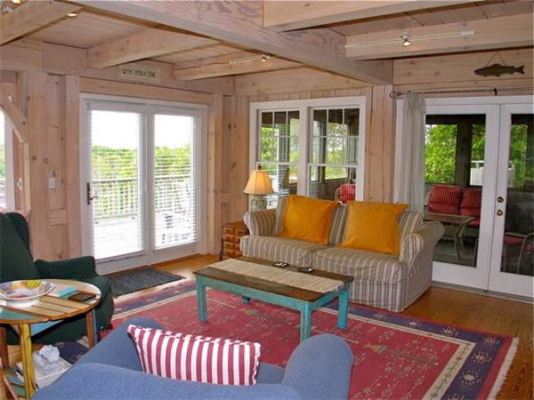 6 Holly Briar Road Aquinnah, MA 02535 - Photo 15 of 15 a living room with furniture and a large window