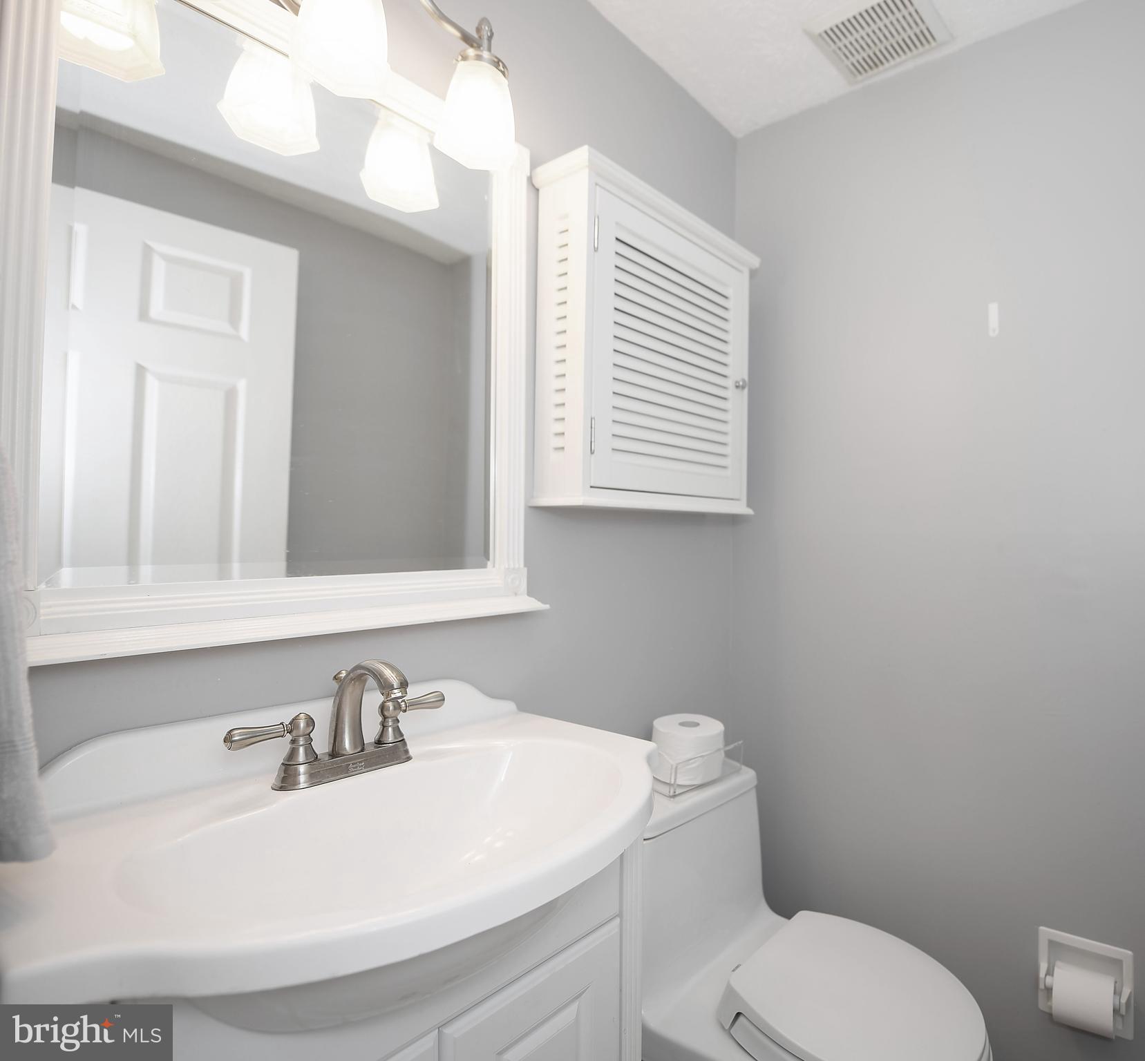 106 Boxthorn Road Abingdon, MD 21009 - Photo 38 of 44 Convenient main level powder room w white vanity