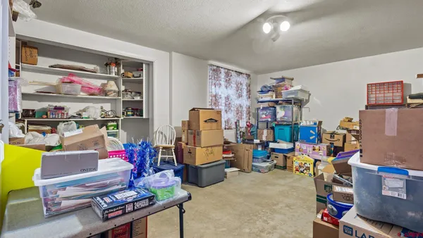 a room with furniture and a desk