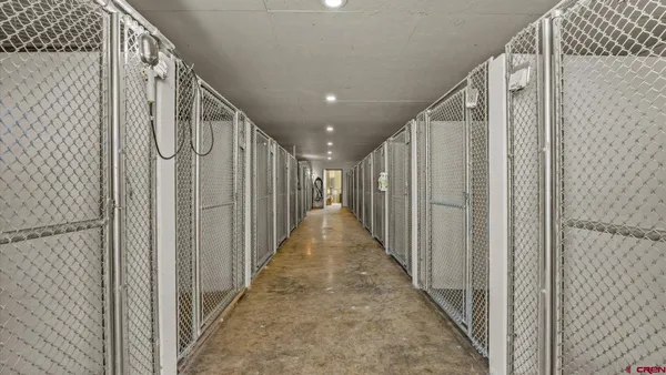 a view of gallery with wooden floor