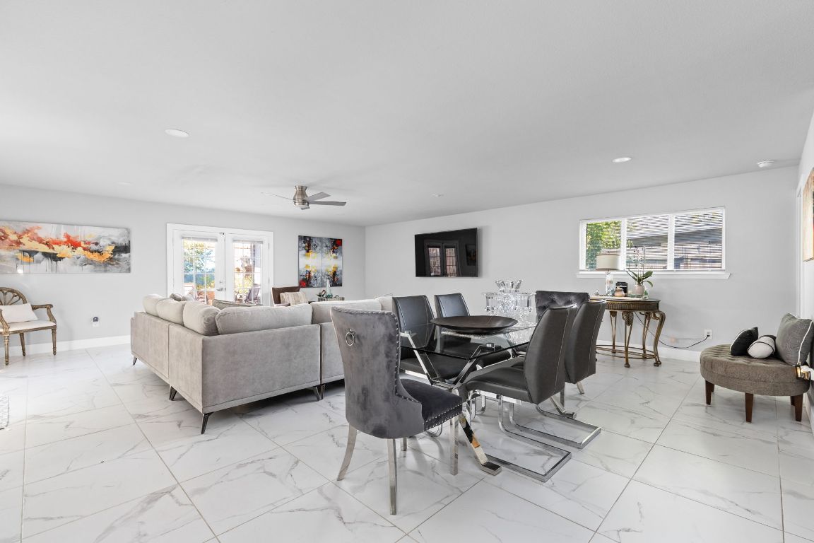 3308 Bengston Street Austin, TX 78702 - Photo 11 of 25 a living room with furniture and a flat screen tv