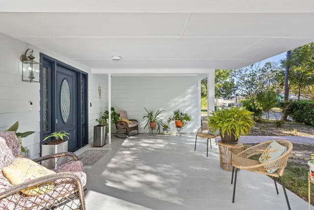 a kitchen with stainless steel appliances a sink stove and cabinets