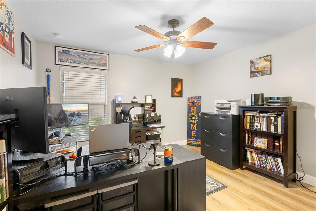 30118 Cheval Street Mount Dora, FL 32757 - Photo 28 of 52 a view of a workspace with furniture and a window