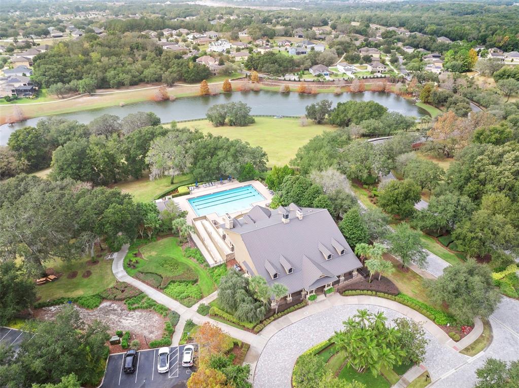 30118 Cheval Street Mount Dora, FL 32757 - Photo 35 of 52 an aerial view of residential houses with outdoor space and river
