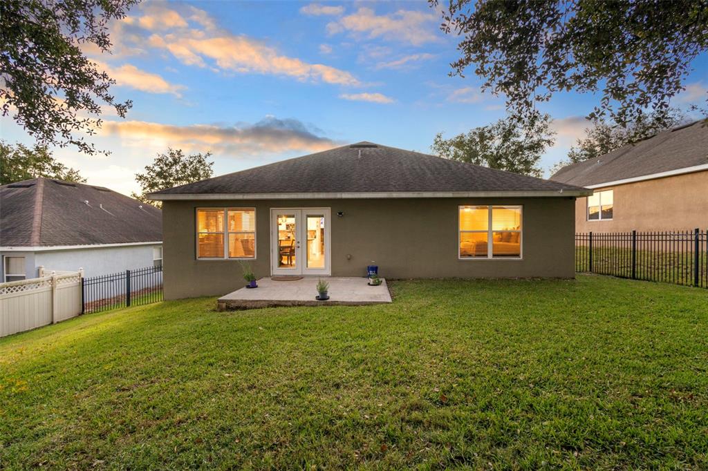 30118 Cheval Street Mount Dora, FL 32757 - Photo 44 of 52 a view of a house with a garden